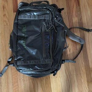 Patagonia Dark Gray Backpack with Green Accents